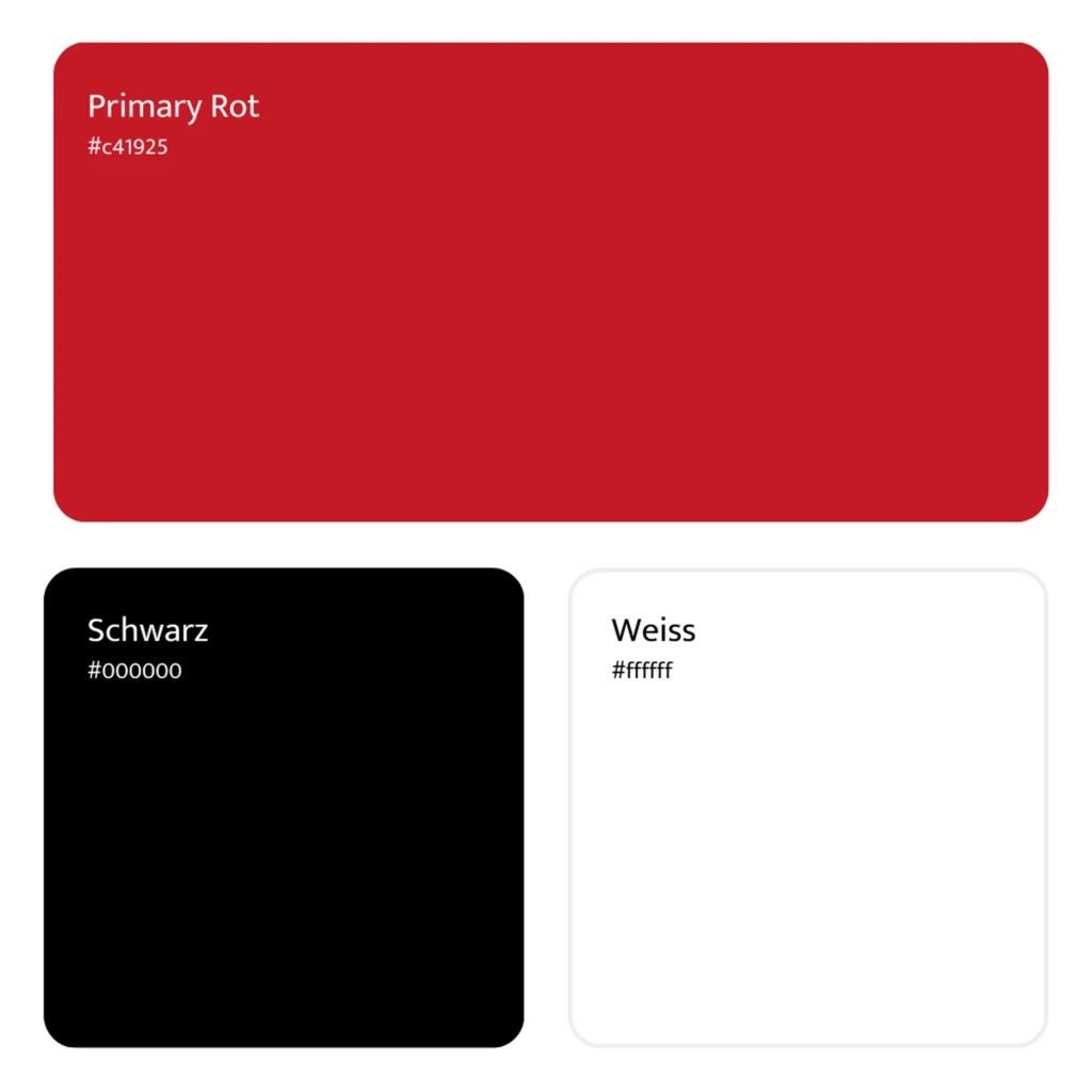 Farbpalette mit kraeftiger roter Primaerfarbe sowie schwarz und weiss als Kontrastfarben.