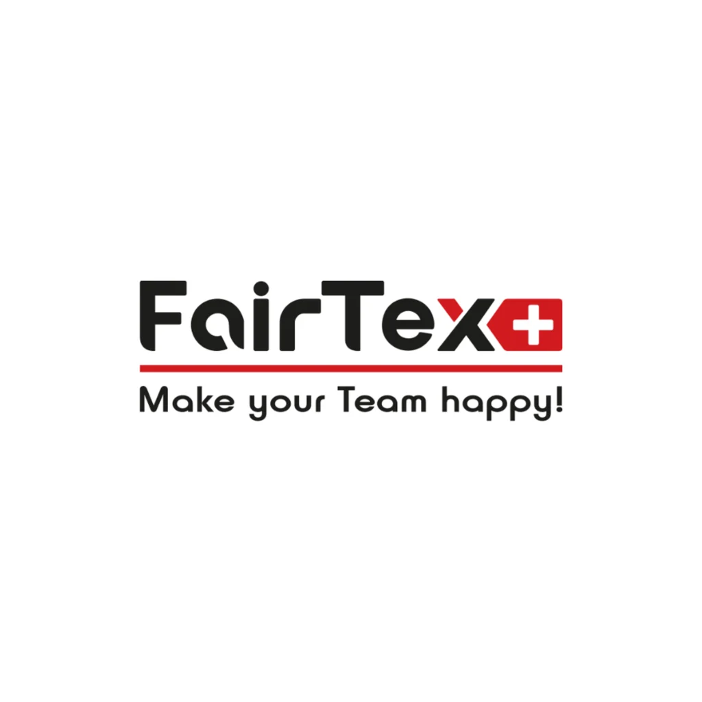 Logo von FairText mit schwarzem Schriftzug, rotem Plus-Symbol und dem Slogan „Make your Team happy!“ auf weißem Hintergrund.